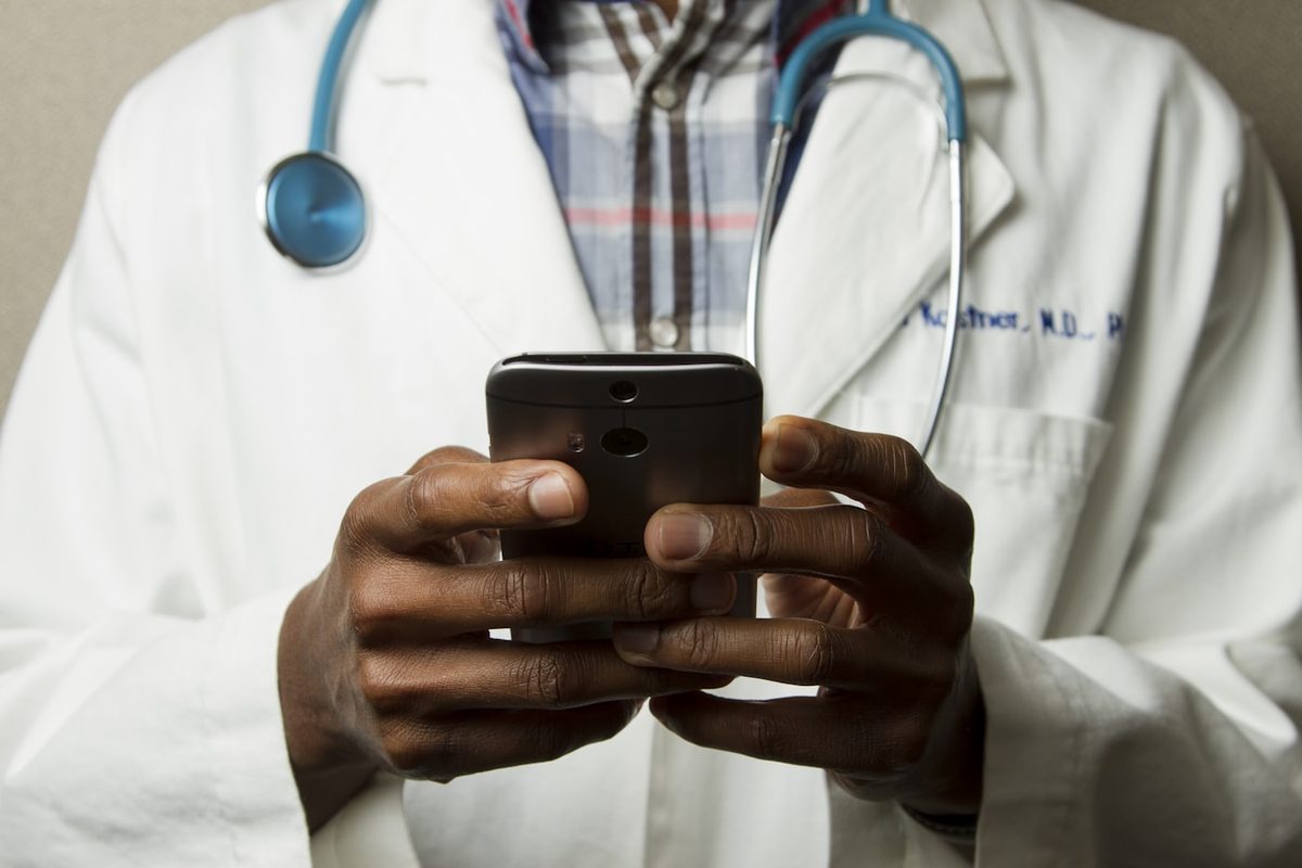 Clinician using mobile app